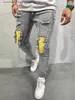 Męskie dżinsy męskie Casual Creative Street Style High Sreth Elaste Faint Splatter Ripped Design Slim Fit Dżinsy Dżinsowe spodnie na wiosenne lato T240205