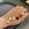 Version de haut niveau S925 argent sterling plaqué or rose 18 carats agate rouge trèfle à quatre feuilles bracelet femmes cinq fritillaria blanche bracelet de bijoux de luxe léger qui ne se décolore pas