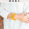Schakelarmbanden Handkoord Armband met één ring Vrouwelijke ruwe minerale kippenolie Gele oude honingkralen vol mannelijk.