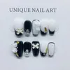 Handgjorda koreanska pressar på naglar kort svartvitt Y2K återanvändbart limfalska naglar båge 3d charm dekorera runda akryl naglar 240129