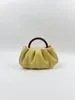 Midjepåsar Specialintresse Design Koreansk minimalism Trähandtag PLESSED MOLDS HANDBAGS KVINNA INS CROSSBODY MINI BAG Fashion