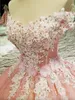 Roze Quinceanera Jurken 2024 Nieuwste 3D Bloemen Applique Handgemaakte Bloemen Kralen Uit de Schouder Korte Mouwen Gala Formele Avonden Baljurk