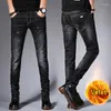 Jeans masculinos outono inverno velet quente denim calças compridas casuais preto azul calças justas