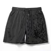 Mens shorts designer sommarkvinnor män bokstäver tryck shorts är elegant simma kort casual sport gym snabb torkning man svarta strandbyxor