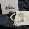 Designer Viviane Westwoods smycken Viviennr Western Empress Dowager High Edition Classic Ouyang Nana 3D Saturn Pin Pearl Armband för kvinnor