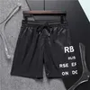 Mens shorts designer sommarkvinnor män bokstäver tryck shorts är elegant simma kort casual sport gym snabb torkning man svarta strandbyxor