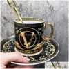 Kopjes Schoteltjes Luxe porseleinen koffie- en elegante theekopset Melk drinken Mok Keukenservies Cadeau met doos Drop Delivery Home Gard Dhfdc