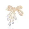 Moda broche de ouro para mulheres zircônio incrustado arco pérola versão coreana camisola feminina jaqueta broche terno pingente peito flor