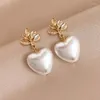 Kolczyki Dangle 2024 Fashion Pearl Heart Kształt dla kobiet Party Temperament Liście Listów Koreańska modna biżuteria