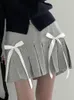 Jupes Mini femmes Vintage Style Preppy jupe plissée doux noeud taille haute femme Y2K fille courte Faldas Para Mujeres