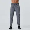 2024 designer calças compridas homens esporte correndo alinhar yoga ao ar livre ginásio bolsos fino ajuste sweatpants pant jogger calças dos homens casual cintura elástica ginásio desportivo s y s y