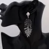 Kolczyki Dangle Bohemian Long Feather Drop for Women Party Trendy European oświadczenie biżuterii retro metalowy prezent