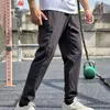 Calças masculinas cor sólida cintura elástica solta cordão esportes casual grande n alto treinamento masculino com bolsos casa meia