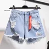 Hög sommarmidja denim shorts kvinnor plus storlek 5xl lösa hål tasslar harajuku heta byxor sexiga jeans kort flicka våren