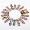 Skateboard giocattolo da dito per bambini 12 pezzi Mini skateboard da dito Giocattolo Skateboard Mini giocattoli da dito Set Skateboard 240125