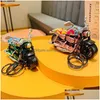 Andere motorfietsaccessoires Cartoon Legering Rebound Speelgoed Creatief Autosleutelhangers Prachtige schooltassen Hangers Kleine cadeaus voor kinderen Dhbw7