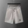 Shorts de bain Marques Hommes Mode d'été Pantalons de plage Designers Board Short Gym Mesh Sportswear Séchage rapide Maillots de bain Impression de motifs pantalons courts