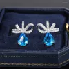 Pendientes de tuerca que venden circonita azul exquisita para mujer, joyería de fiesta a la moda, lazo, boda, novia