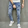 Jeans da uomo Pantaloni skinny strappati Maschio Y2K Fori hip-hop Pantaloni slim denim blu vintage casual strappati per abbigliamento da uomo