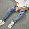 Jeans da uomo Pantaloni skinny strappati Maschio Y2K Fori hip-hop Pantaloni slim denim blu vintage casual strappati per abbigliamento da uomo