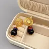 Boucles d'oreilles pendantes rétro européenne et américaine, disque creux en pierre de verre pour femmes, placage élégant, bijoux en or 18 carats, vente en gros