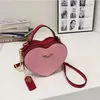 C Desinger Heart Bag Miniキュートショルダーバッグ女性Coabagハンドバッグヴィンテージ曇りのトートレザーファッションピンククロスボディ