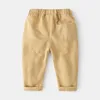 Детские повседневные брюки для мальчиков, хлопковые модные пуговицы, весенне-осенние детские однотонные брюки, длинные свободные брюки, одежда 28 лет 240131