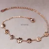 Anklets Nytt titanstålmärke smycken 7 Daisy Anklets för kvinnor Rose Gold Color Fashion Prevent Allergy Summer Jewelry YQ240208