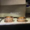 Luksusowy zespół biżuterii New Baojia v Gold High Edition Liuding Ceramic Edge Spring z trzema i dwoma pierścieniami Pierście