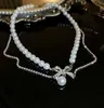 Collar clásico de diseñadora, cadena colgante de bucle estrangulado, collar de perlas con letras chapadas en oro, collar de joyería, collar de regalo