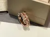 Bijoux de luxe anneaux de bande Fengxin en forme d'os de serpent ouvert Baojia femmes à la mode et Style de déesse anneau incolore Tbko