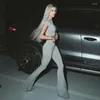 Arbetsklänningar Bangniweigou 2024 Kort ärm Crop Top High midja Flare Pants Tvåverk Set Women Street Grey Tracksuit Skinny Kpop Outfits