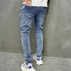 Jeans da uomo Pantaloni skinny strappati Maschio Y2K Fori hip-hop Pantaloni slim denim blu vintage casual strappati per abbigliamento da uomo