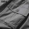 Pantalones Cargo de Color liso con múltiples bolsillos para hombre, pantalón plisado con cintura elástica, estilo Safari, holgado, recto, pierna ancha, para correr, 240126