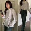 Kvinnors T -skjortor 2024 Koreansk stil skjorta fast färg fransk nisch design sned knapp båge band lotus krage lanter ärm