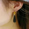 Boucles d'oreilles pendantes en résine noire et rouge pour femmes, boucles d'oreilles de styliste de personnalité, vente en gros