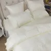 Conjuntos de cama High End Luxo Coreano Princesa Estilo Cama Saia Conjunto com quatro peças de algodão longo veludo puro laço borda beddin