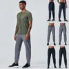 Pantalons pour hommes Hommes Printemps et été Lâche Soie de glace Courir en plein air Fitness Yoga Loisirs Entraînement Solide Couleur Simple Séchage rapide