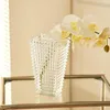 Vaser glas vas litet transparent vatten upphöjd blomma arrangemang ljus lyxig high-end vardagsrum avancerad känsla