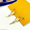 Trevligt gyllene lås och nyckelmärke örhänge bokstäver smycken öronbockar uppsättning för charm dam mode guld örhänge flicka fest hoop örhängen med original presentförpackning