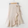 Spódnice dla damskiej mody w kratę drukowaną elastyczne asymetryczne marszki średniej długości