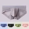 Cuecas masculinas de seda roupa interior sexy u convexo briefs ultra fino sólido calcinha cintura baixa respirável secagem rápida mens breve galo grande bolsa