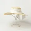 Berets 202404-HH5147 Chic Drop Summer British Hollow Out Paper Grass Bowknot Lady Fedoras Cap Women Panama Jazz Hat