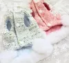 Abbigliamento per cani Vestiti fatti a mano Cappotto per animali domestici Abito in tweed Set gemelli di lusso Elegante gonna a torta con trama di camelia alla moda e colori fini