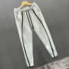 Men's Pants Spring Fashion Brand Spliced American Design Feeling Bound Feet 9/4 Loose And Handsome Explosive Street Casual