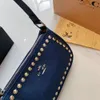 Le nouveau Cowboy Liu Nail de Koujia sac à une épaule sous les bras pour femmes, sac pour téléphone portable 75% ventes directes d'usine