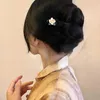 ヘアクリップは輝くu中国スタイルの花木製ヘアピン女性のためのファッションアクセサリー