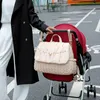 Coton Quilting imperméable multifonctionnel mère et bébé sac à dos bébé voiture sac suspendu pour envoyer un tampon d'urine facile à transporter 240118