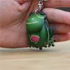 Cowhideクリエイティブハンドメイドスモールカエルペンダントバッグオーナメントカーキーチェーンかわいい動物小さなカエル人形ギフト240122