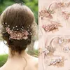 Haarspeldjes 4 stuks bruids parel kristal bloem kam haarspelden set luxe metalen tiara's bruiloft bruid sieraden accessoires